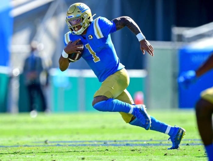 Nov 15, 2020; Pasadena, California, USA; UCLA Bruins quarterback Dorian Thompson-Robinson (1) runs in the second half against the California Golden Bears at the Rose Bowl.